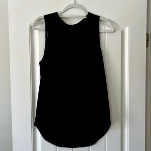 Lululemon women’s size M black nylon tank with mesh and cutout on back.